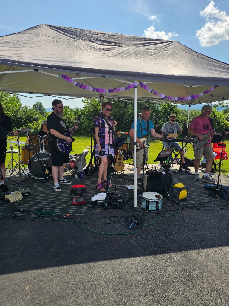 cathi speaking at her best of the best party with five and a half men